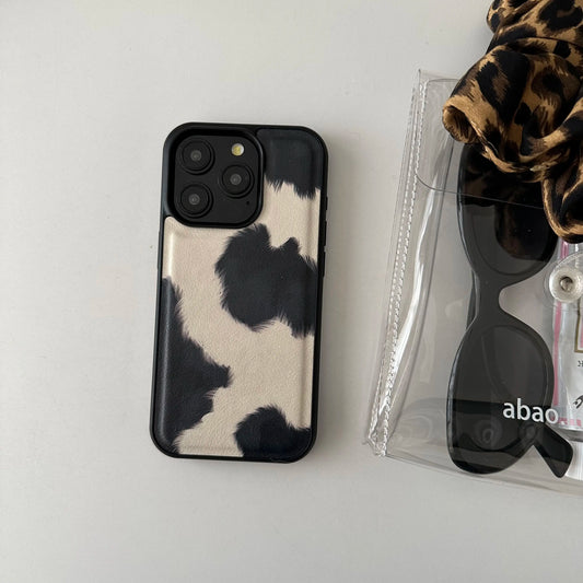 Chic Cow-Pattern Artificial Leather Phone Case for iPhone 16–11 Series