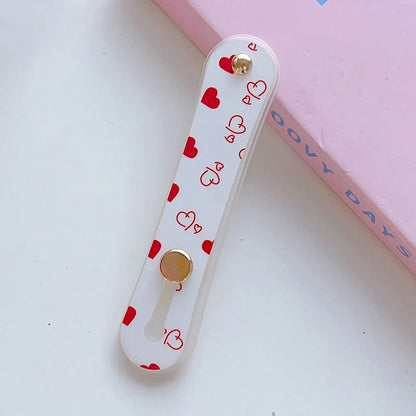 Universal Silicone Finger Ring Holder & Phone Stand – Telescopic Grip